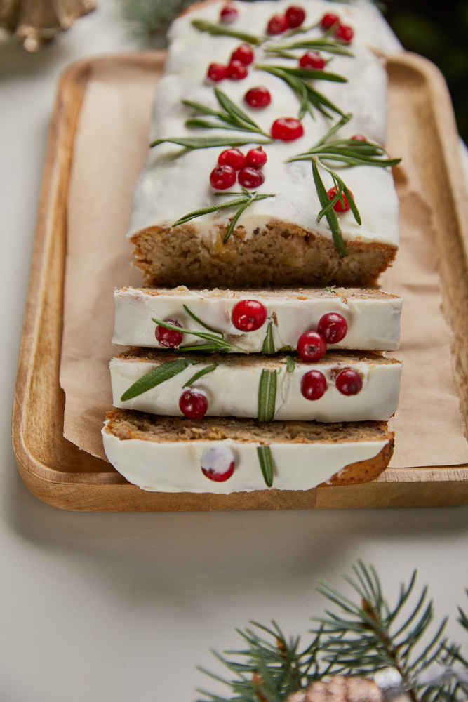 white christmas cake with cranberries and other herbs